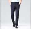 Stretch business pants in charcoal gray showing wrinkle-resistant properties after hours of wear