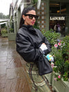 Chic faux leather bomber jacket for women, perfect for autumn fashion and versatile layering with a stylish turtleneck collar
