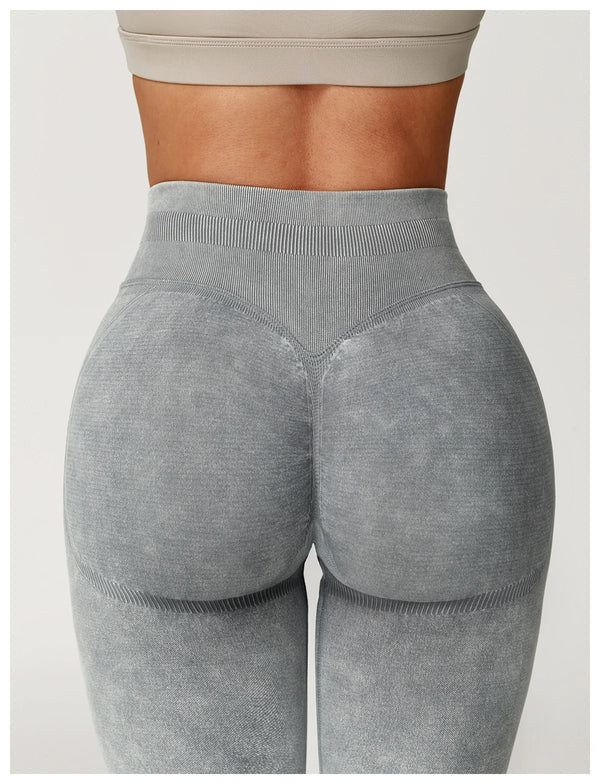 Black ribbed yoga leggings with high-rise waistband for support.