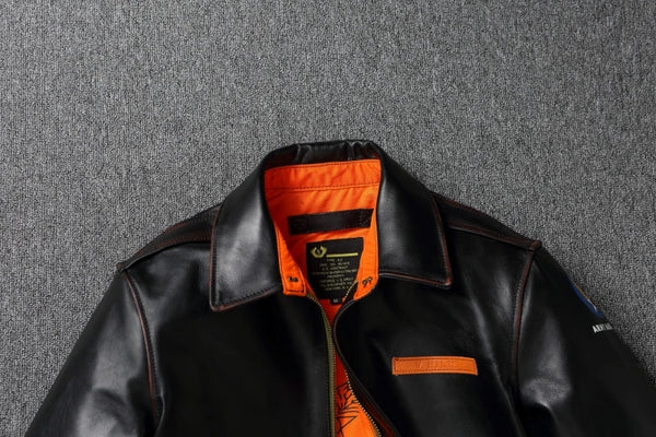 Vintage A2 leather flight jacket paired with jeans for a casual look.