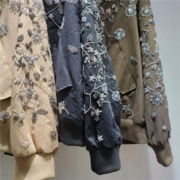 Close-up of tatting weave technique and sequin application on polyester fabric
