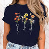 Floral print women's tee featuring 'Faith Hope Love' message, perfect for casual wear and versatile styling options.