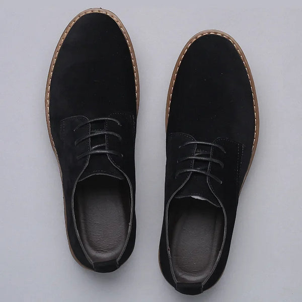 Stylish men's dress shoes with a sleek matte finish.