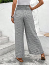 Floral wide-leg chiffon pants for women, ankle-length, elastic waist, perfect for summer fashion and casual chic outfits.