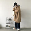 Chic Japanese vintage trench coat for men in black, perfect for autumn and winter travel with a stylish turn-down collar.