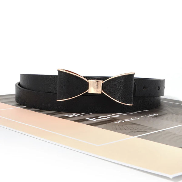 Elegant women's belt with bow detail in premium faux leather, perfect for casual and formal outfits. Versatile fashion access
