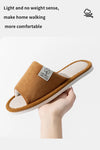 Cotton-linen slippers arranged on cozy home interior background