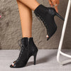 Dance boots featuring elegant thin heels and convenient zip for rapid costume changes