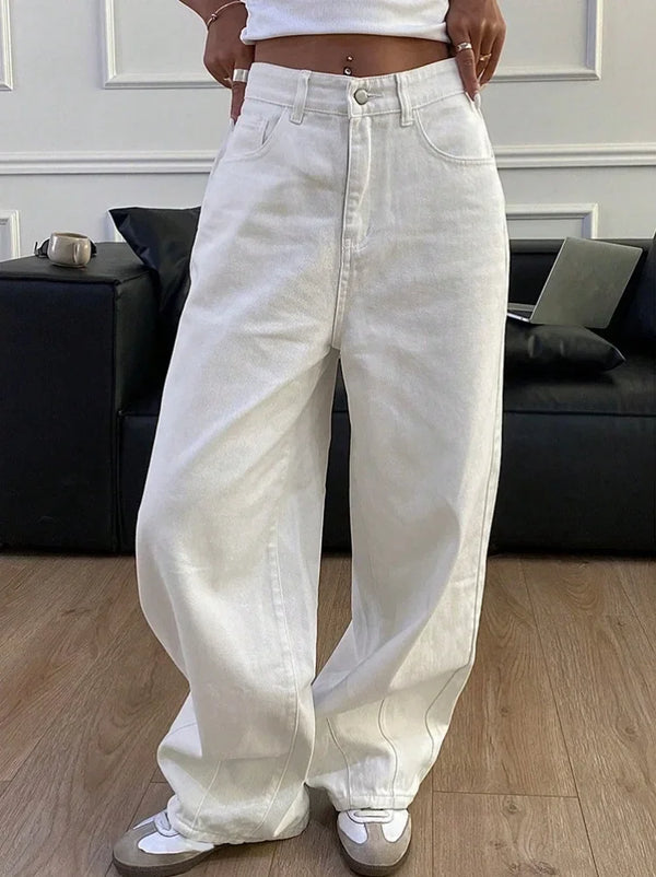 White denim wide leg jeans featuring high waist design and button pocket details