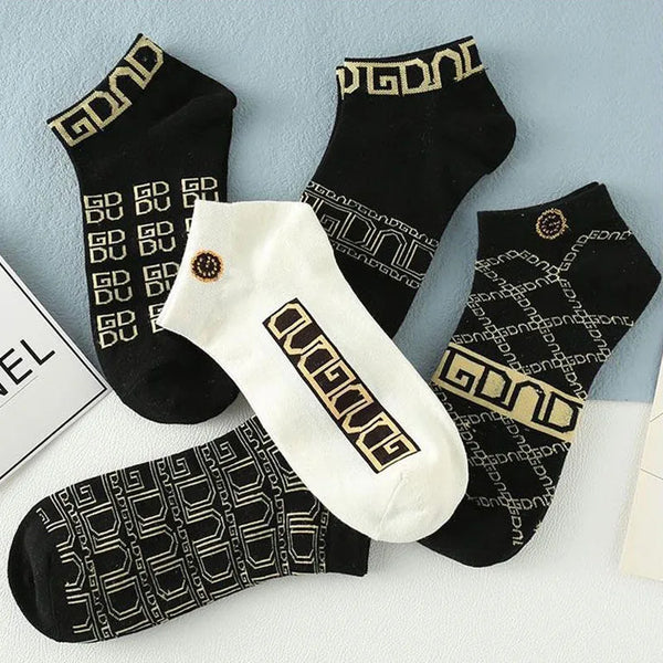 Lightweight designer ankle socks in a modern geometric pattern, ideal for any occasion.