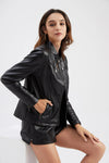 Chic women's slim leather biker jacket with zip detail, stand-up collar, and tailored fit for stylish urban looks.