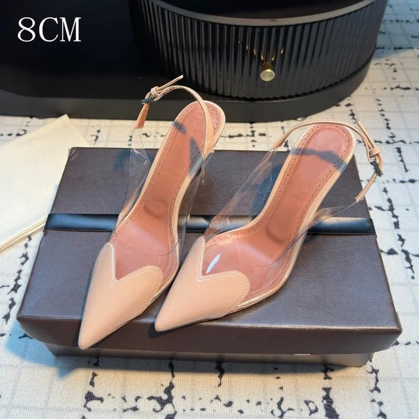 Clear PVC pumps with pointed toe and elegant heel design