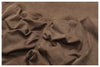 Sand beige ankle-length yoga leggings with elastic waistband.