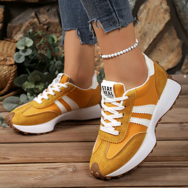 Women's fashion sneakers featuring colorful patchwork and rubber sole