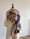 Cashmere-blend scarf elegantly draped over a stylish coat.