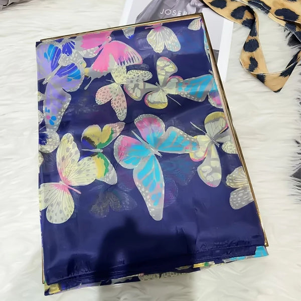Autumn Whisper silk scarf displayed in a gift box, perfect for luxury gifting.
