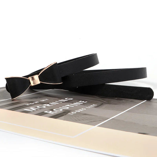 Elegant women's belt with bow detail in premium faux leather, perfect for casual and formal outfits. Stylish and versatile ac
