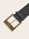 Vintage wide belt for women in black faux leather with metal buckle, perfect for casual or formal wear. Stylish accessory.