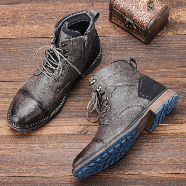 Men's brown leather ankle boots with side zip closure and Western-inspired design