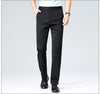 Black dress pants with stretch knit construction for comfortable all-day office wear