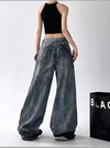 Trendy high-waist wide-leg ripped jeans for women with tie-dye and distressed detailing, perfect for casual street style.