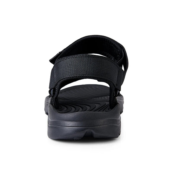 Men wearing black cushioned sandals with adjustable straps for secure fit
