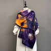 Stylish printed scarf wrapped around the neck for warmth.