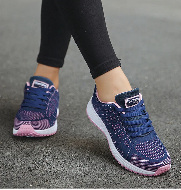 Lightweight white sneakers with multi-color trim for active women