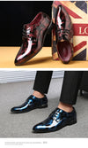 Lace-up closure detail on stylish floral men's Oxford shoes.