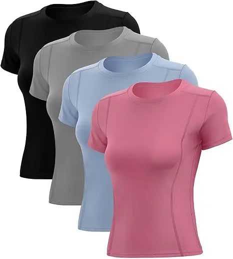 Woman wearing breathable nylon short sleeve yoga shirt in studio performing warrior pose