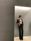 Chic cropped leather jacket for women in faux leather, featuring a turn-down collar and zipper closure, perfect for autumn an