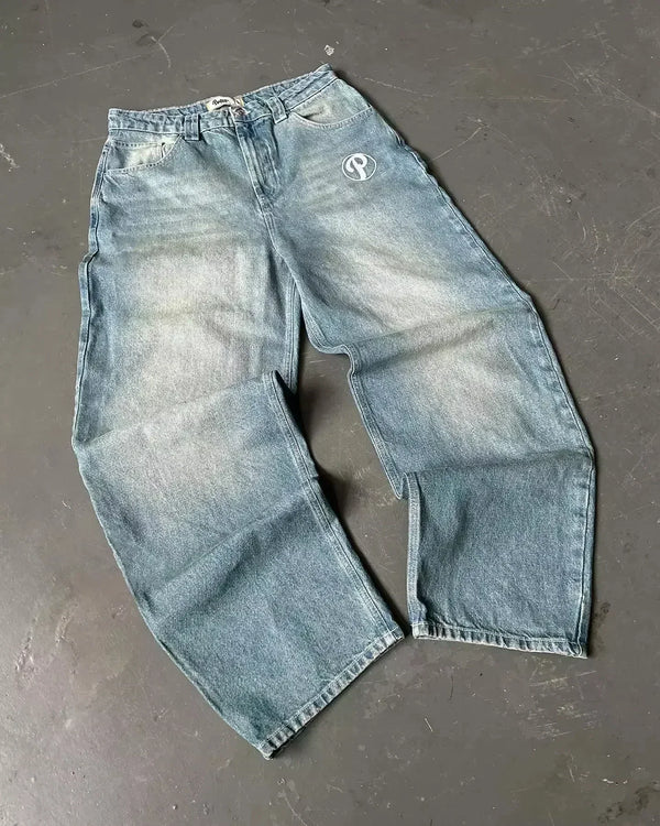 Blue wide-leg jeans featuring relaxed fit and artistic designs.