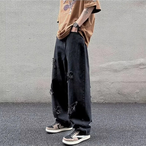 Trendy blue denim jeans featuring a relaxed fit and full-length design.