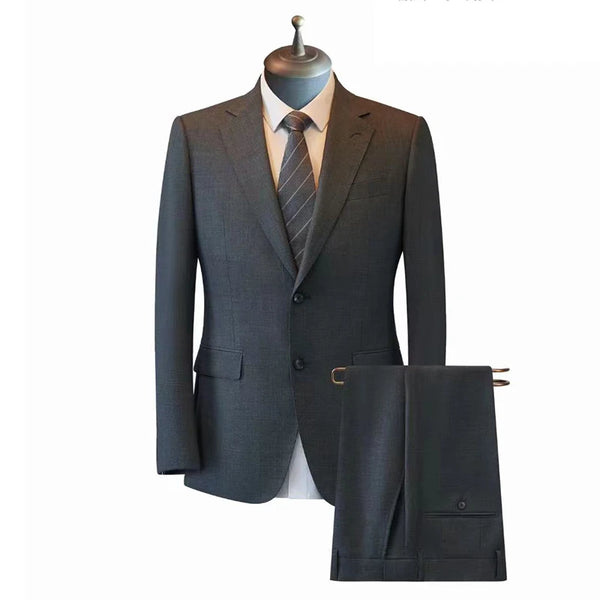 Tailored Super 150 wool suit in navy, showcasing a modern silhouette and impeccable craftsmanship.