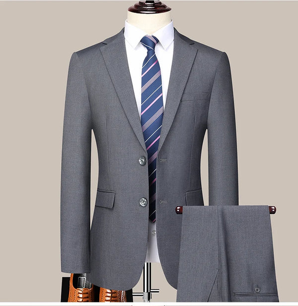Model wearing the suit with a tie, ideal for business meetings.