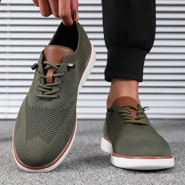 Top view of men's knitted walking shoes showing breathable mesh pattern and lace system