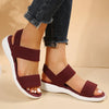 Casual wedge sandals with adaptive stretch fabric and cushioned footbed for all-day comfort