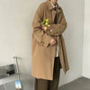 Chic Japanese vintage trench coat for men in black, featuring a single-breasted closure and stylish turn-down collar.