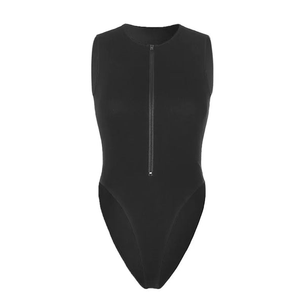 Woman wearing black bodycon bodysuit with confident pose