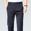 Slim-fit dress pants with flat front and zipper fly in classic black for professional wear