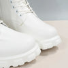 Chic white ankle boots with chunky heel, lace-up closure, and durable PU leather for stylish fall/winter outfits.