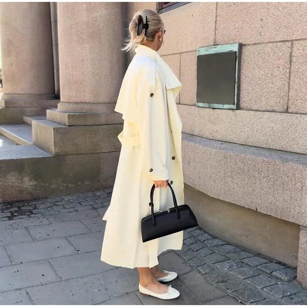 Sophisticated long cream trench coat perfect for professional and casual wear