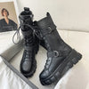 Chic mid-calf motorcycle boots for women with lace-up closure, non-slip outsole, and stylish PU leather for winter wear.