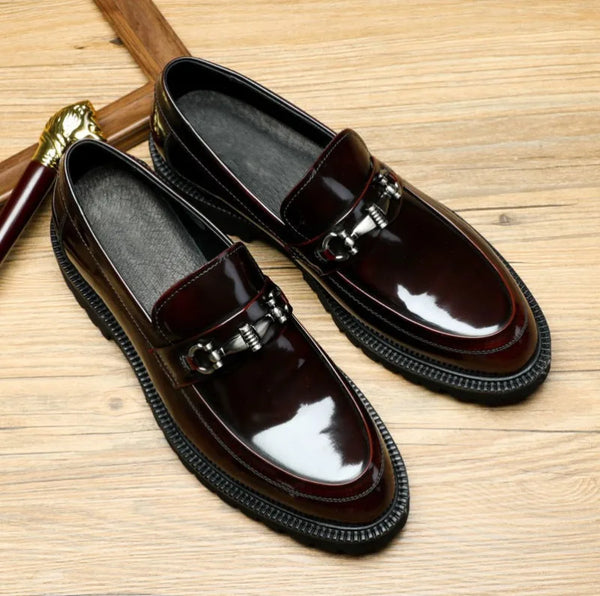 Black Oxfords with a modern twist, ideal for stylish men.