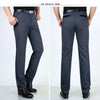 Classic men's dress pants in premium cotton, perfect for business and casual wear with a sleek straight leg design.