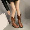 Chic Women's Mid-Calf Chelsea Boots in pleated leather, waterproof, non-slip, perfect for Winter 2024 style and comfort.