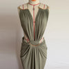 Formal halter neck dress with open back and strategic side cutout accents