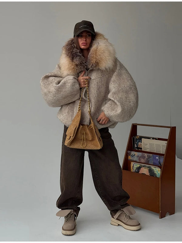 Plush hooded jacket in relaxed oversized fit perfect for layering