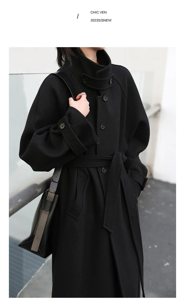 Elegant long trench in premium wool blend with contemporary styling