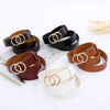 Chic double ring PU leather belt for women in classic black, perfect for jeans, dresses, and versatile fashion outfits.